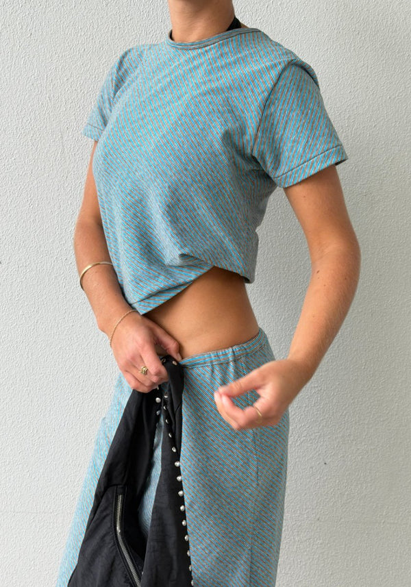 Bassike Bias Stripe Baby T-Shirt in Blue/Brown Stripe, side view showing cropped fit