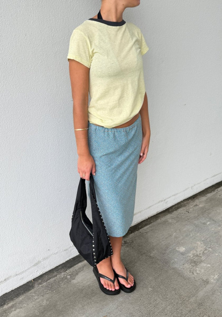 Bassike Bias Stripe Skirt in Blue/Brown Stripe, three-quarter side view showing bias drape