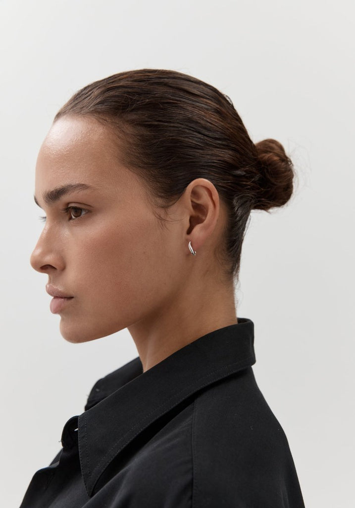 Nina Gordon Debut Hoops Silver worn on model, side profile