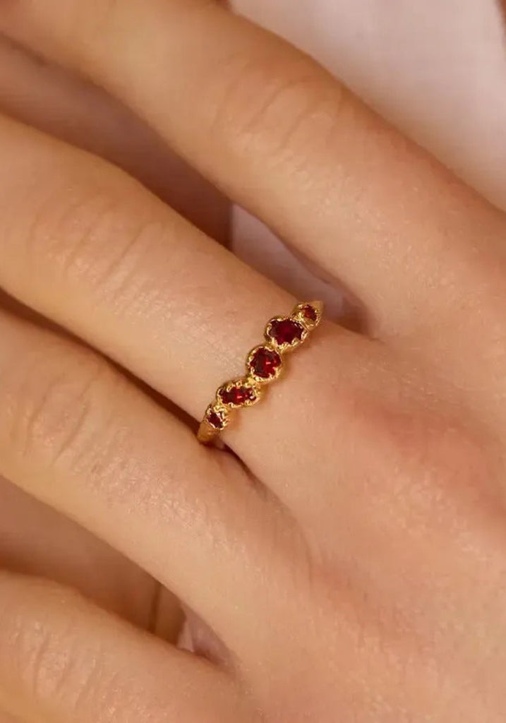 Agapée Koré Red Ring worn on model's finger