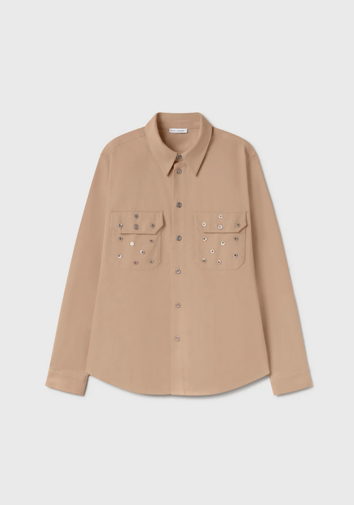 Beige shirt with decorative buttons on a light gray background