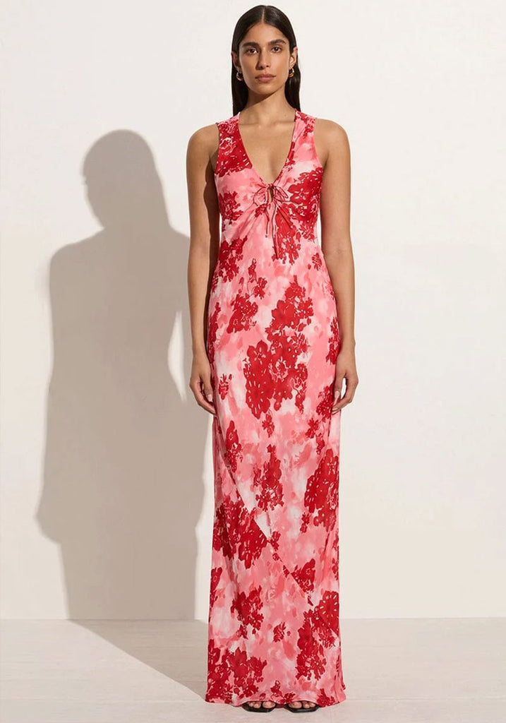 Woman wear red & pink floral dress with tie v neck low cut maxi dress.